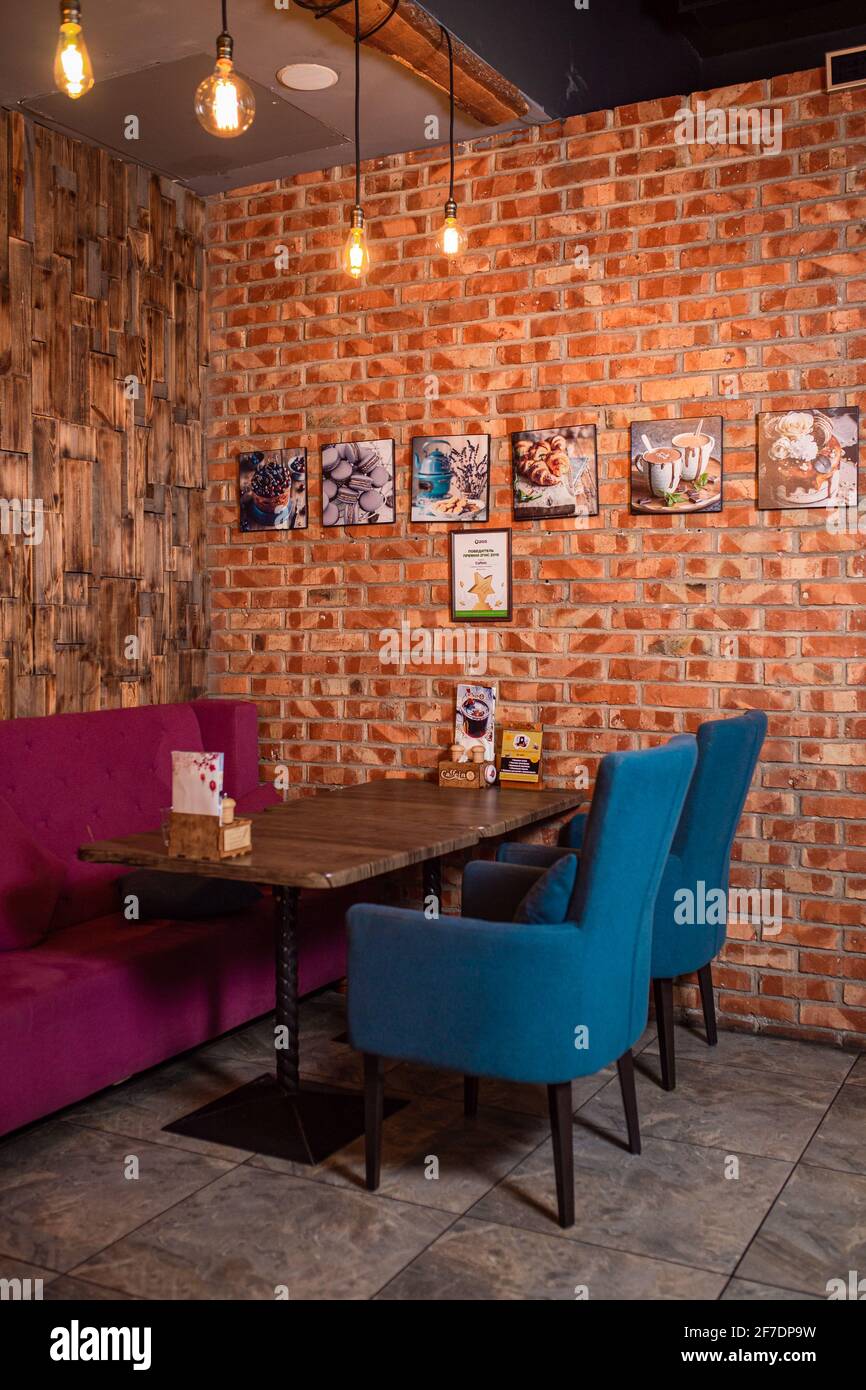 interior in a cafe with brick walls Stock Photo - Alamy