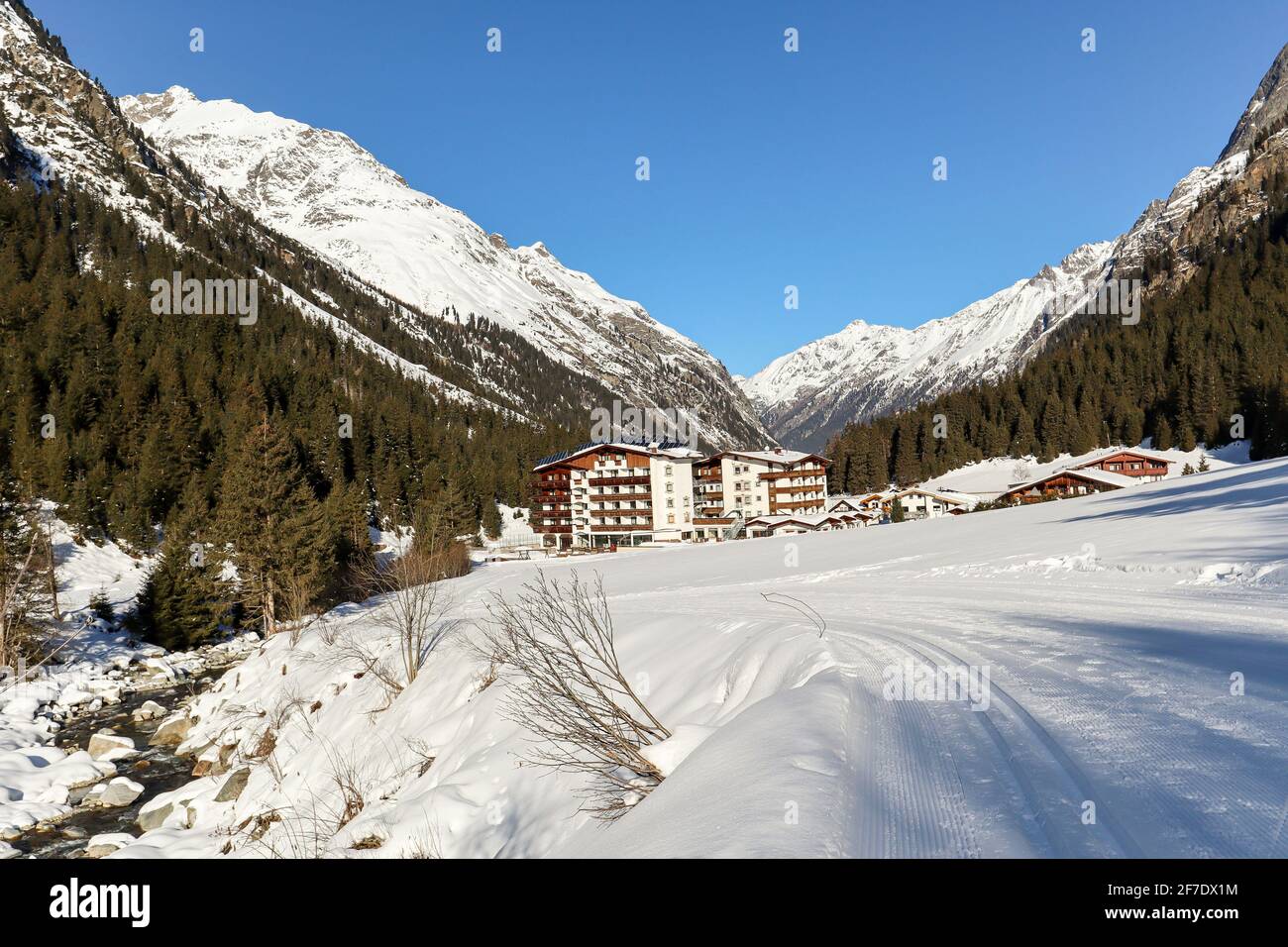 Cross-country skiing trail through the Pitztal near Sankt Leonhard in Tirol, winter sports in snowy landscape in the Austrian Alps, Austria Europe Stock Photo