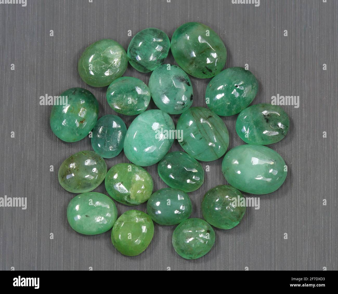 Natural gemstone green emerald beryl on background Stock Photo