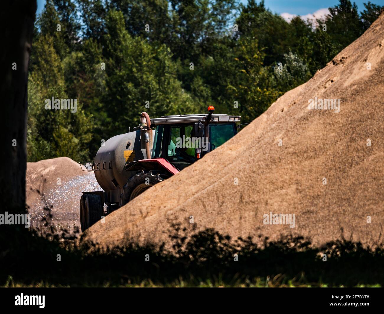 A plant for the production of crushed stone, gravel and sand. Quarry, machines and conveyors. Stock Photo