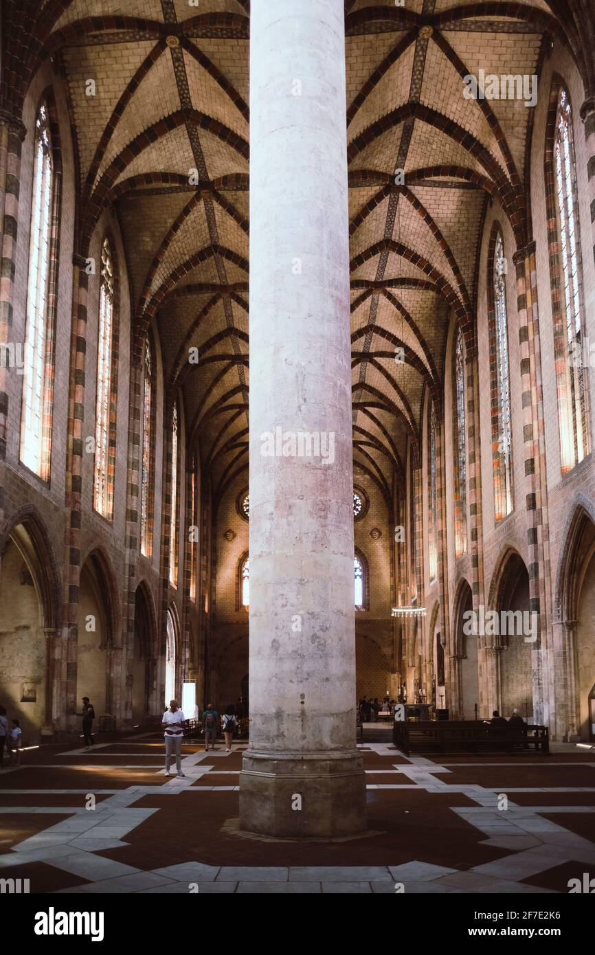 Toulouse, Occitania, France; July 22, 2018: Interior of the Temple of the Jacobins with the column that supports the palm tree in the center. Stock Photo