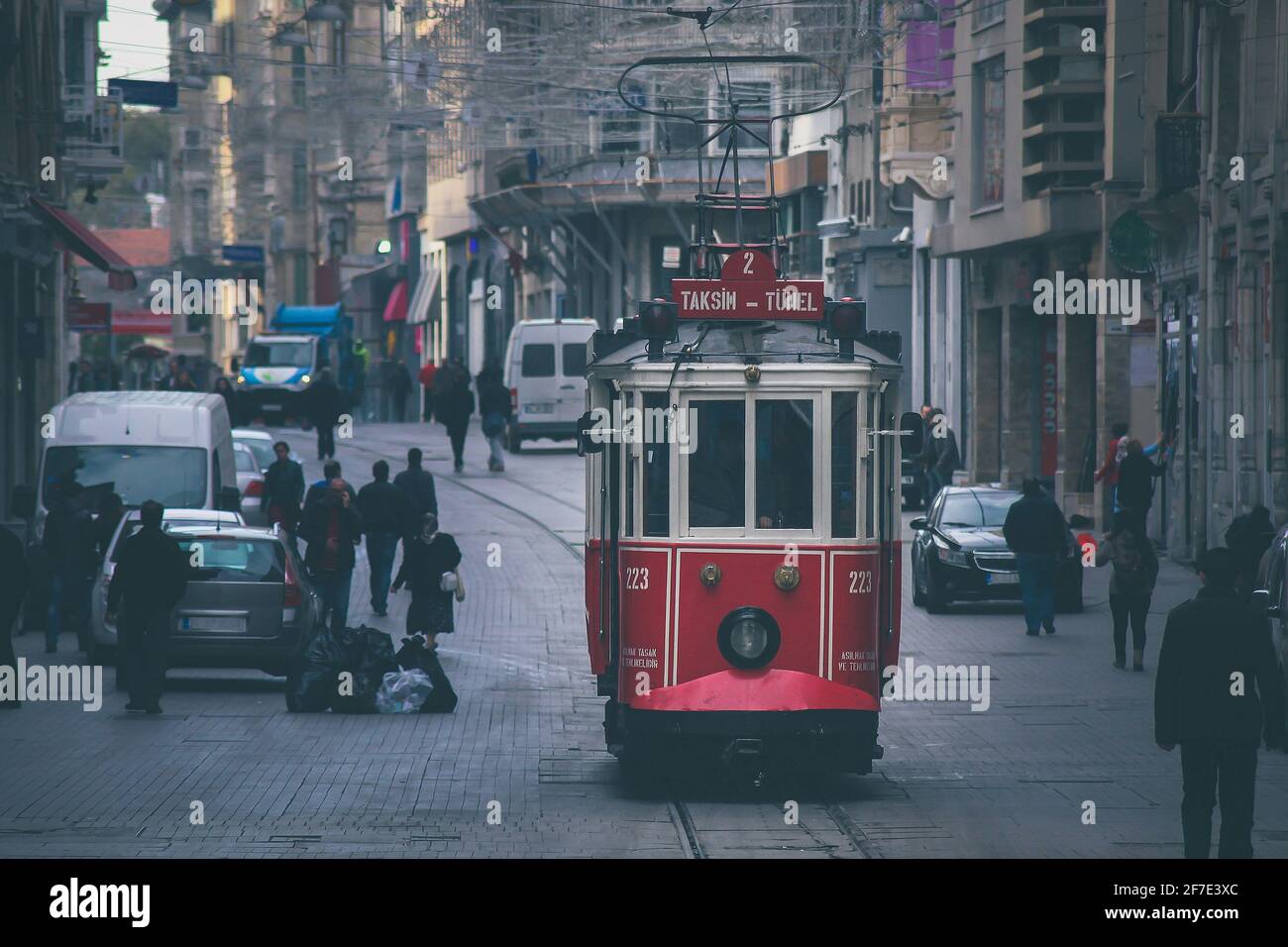 Old vintage tram in istambul, traveling in the early foggy morning between Taksim square and tunnel. Stock Photo