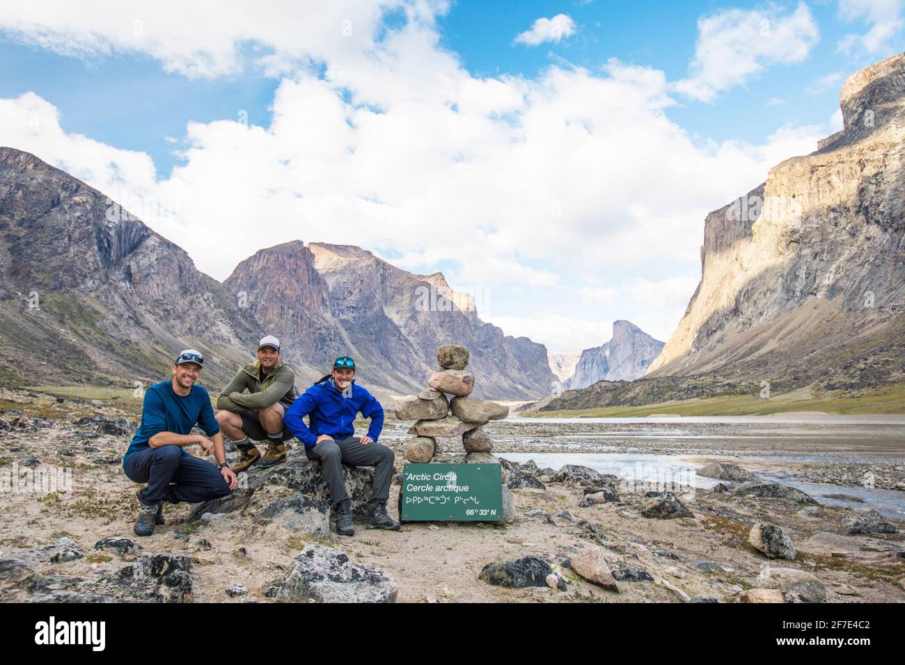 Three mountaineers pose for picture at the Arctic Circle Akshayuk Pass Stock Photo