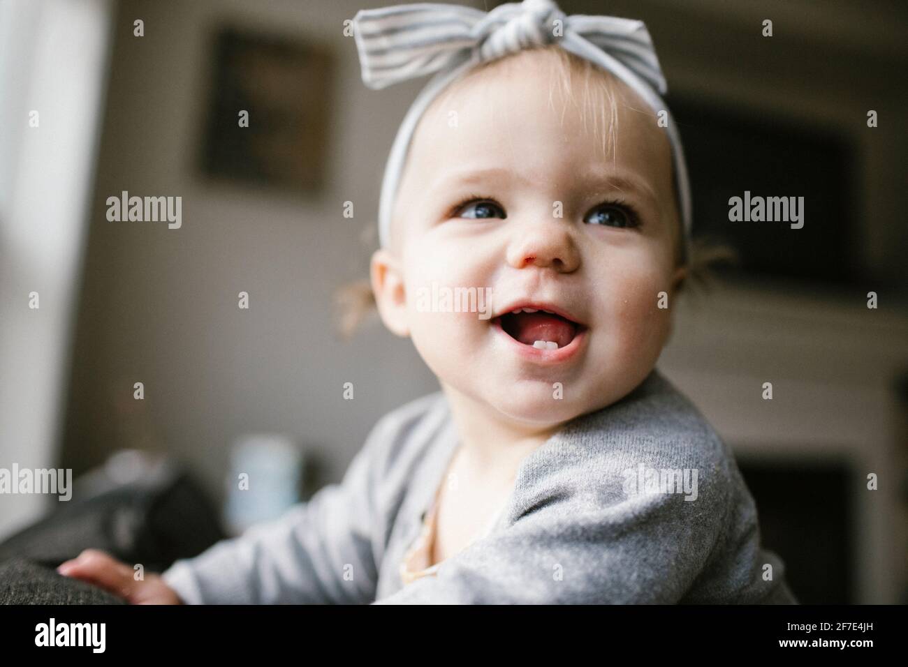 Close up of happy one year old smiling at home. Stock Photo