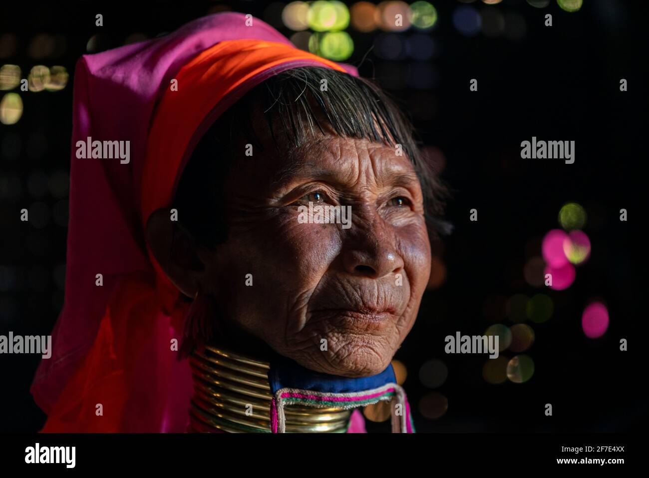 Senior Kayan woman wearing traditional neck rings, Loikaw, Myanmar Stock Photo