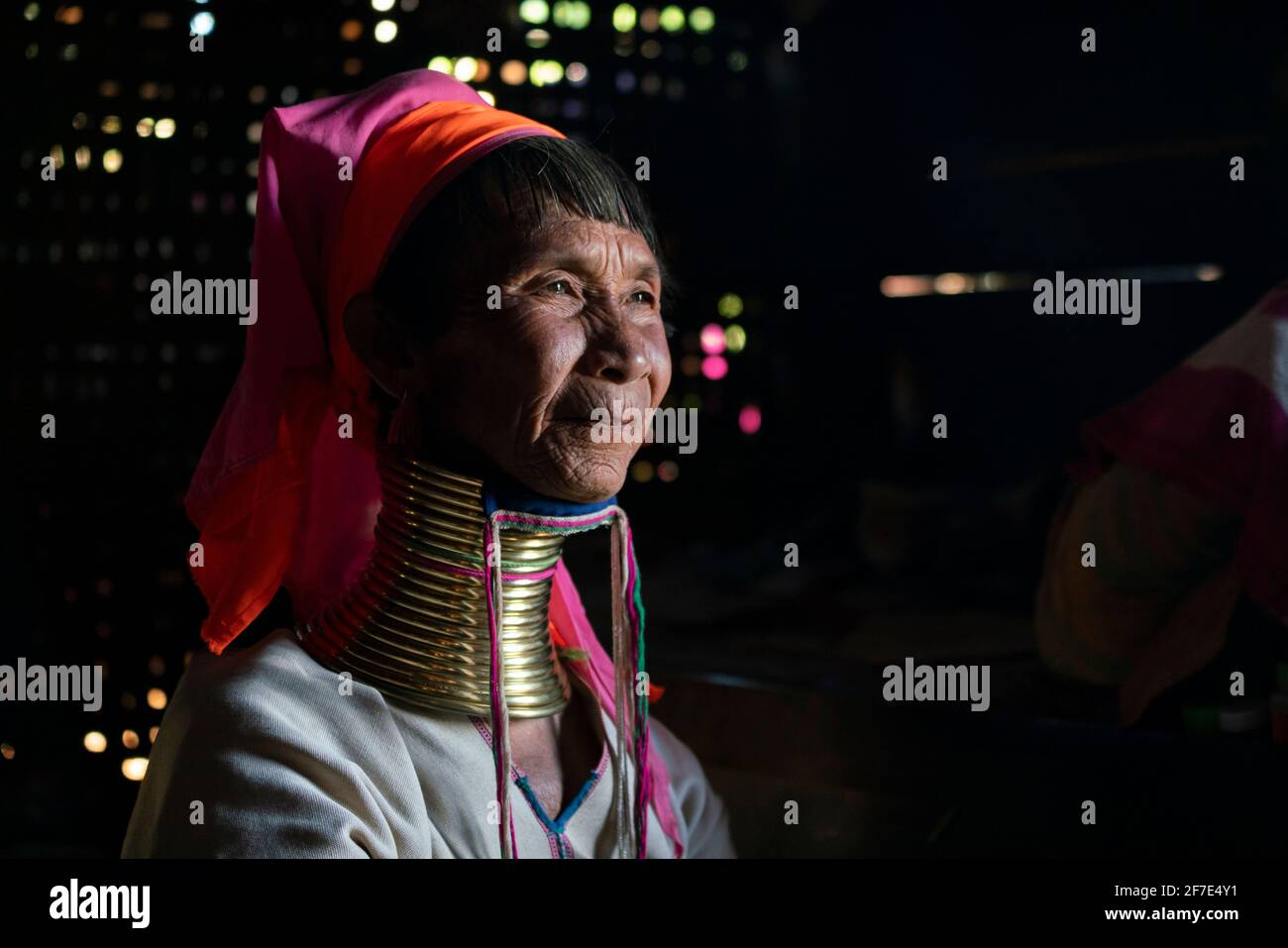 Kayan woman wearing traditional brass neck rings, near Loikaw, Myanmar Stock Photo