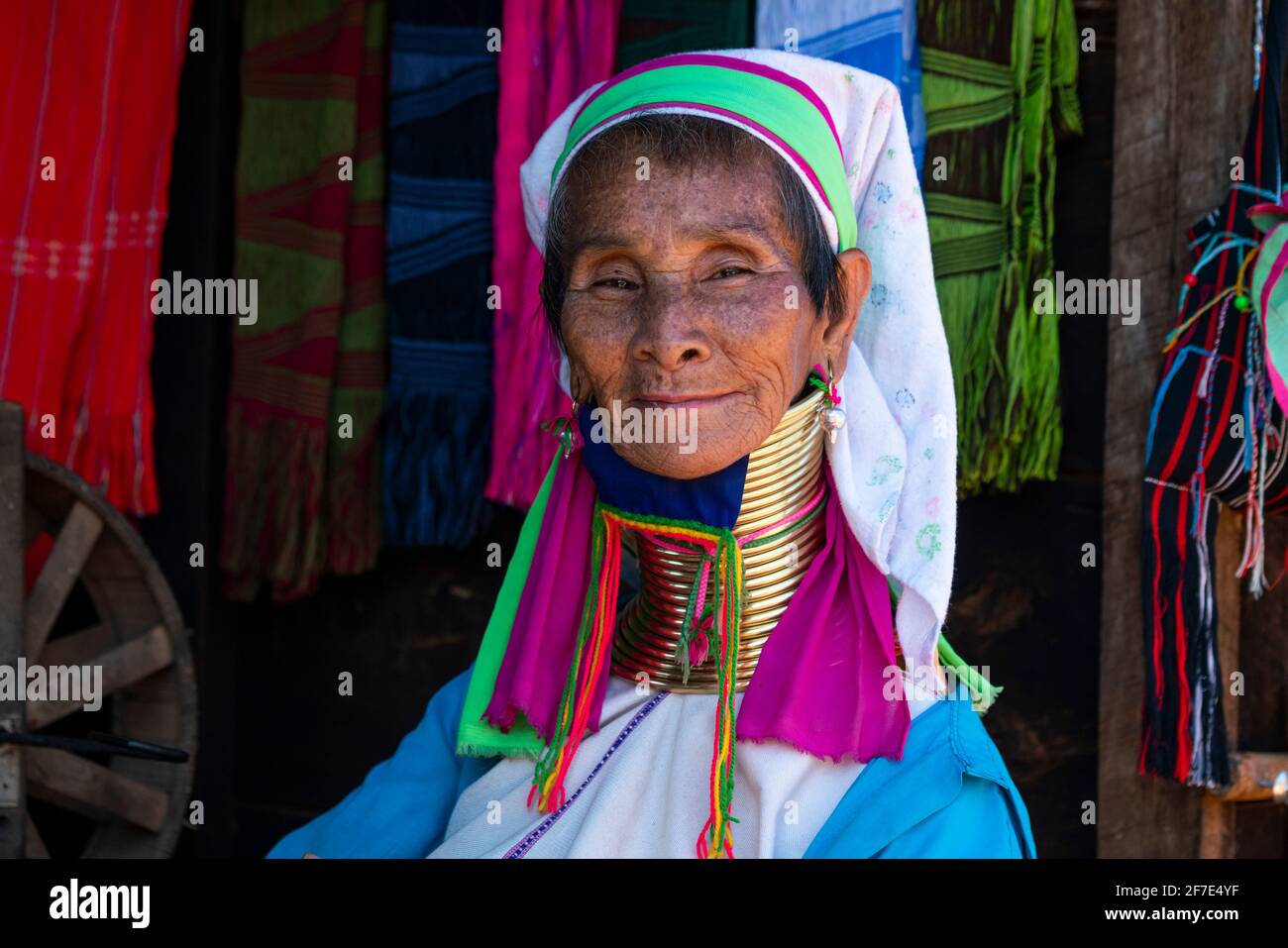 Kayan woman wearing traditional brass neck rings, near Loikaw, Myanmar Stock Photo