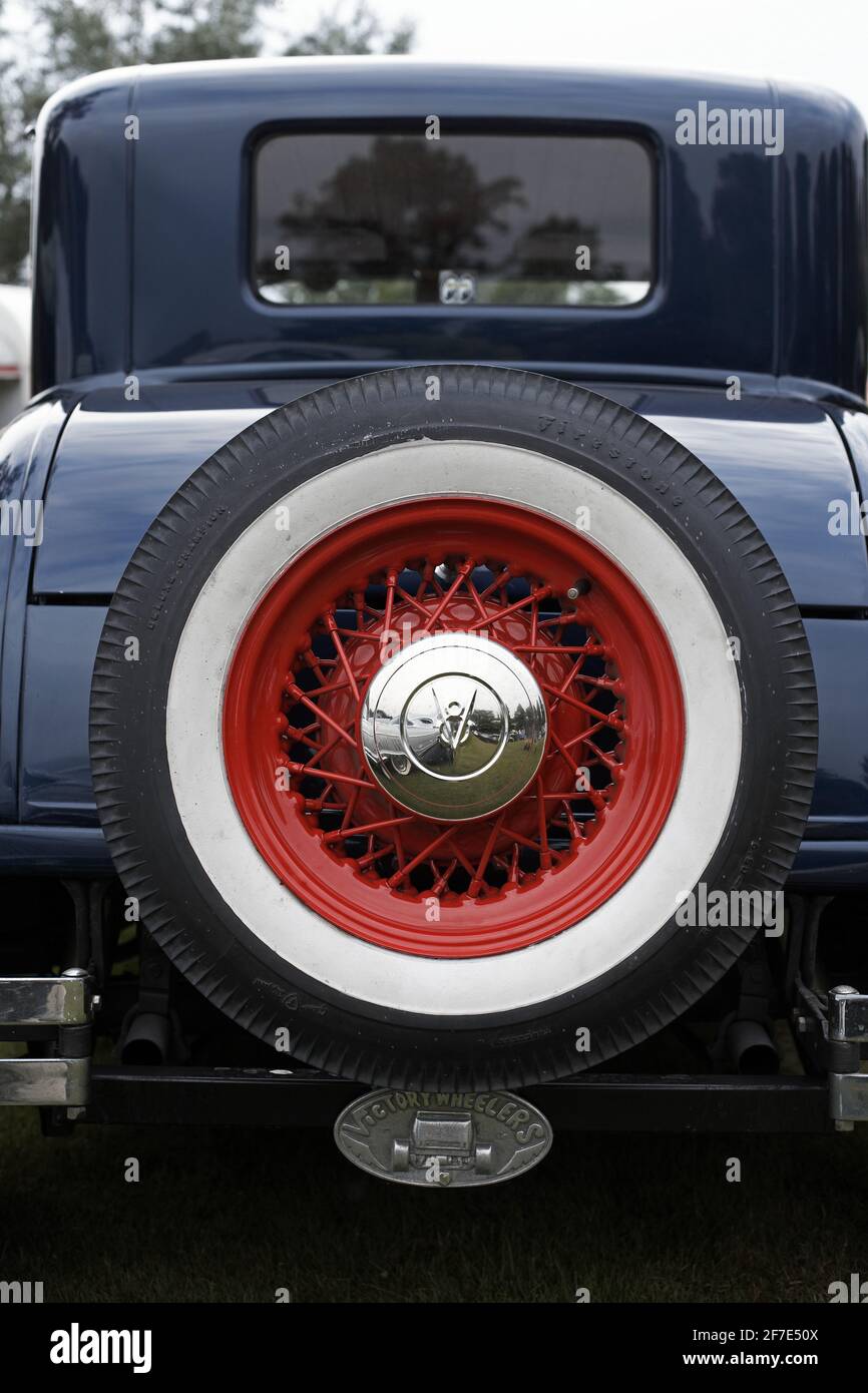 Ford V8 Car from behind. Spare wheel of a 1935 Ford V8 touring sedan . rear view of a 1935 Ford V8 Fordor Touring Sedan. Stock Photo