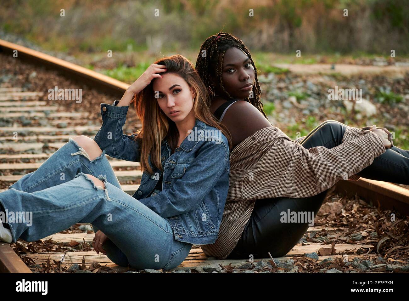 Two women posing together hi-res stock photography and images - Alamy