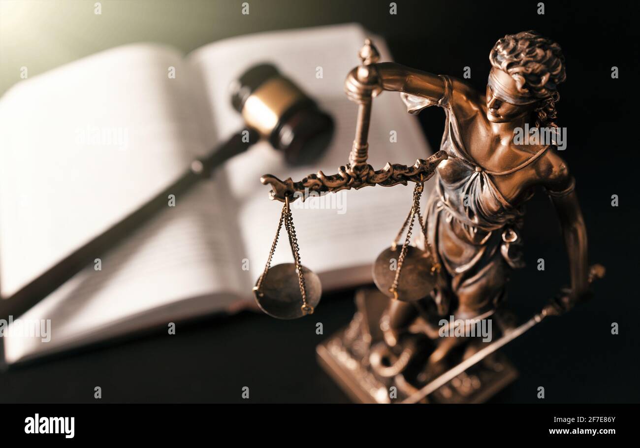 Lady justice. Statue of Justice in library. Legal and law background concept Stock Photo