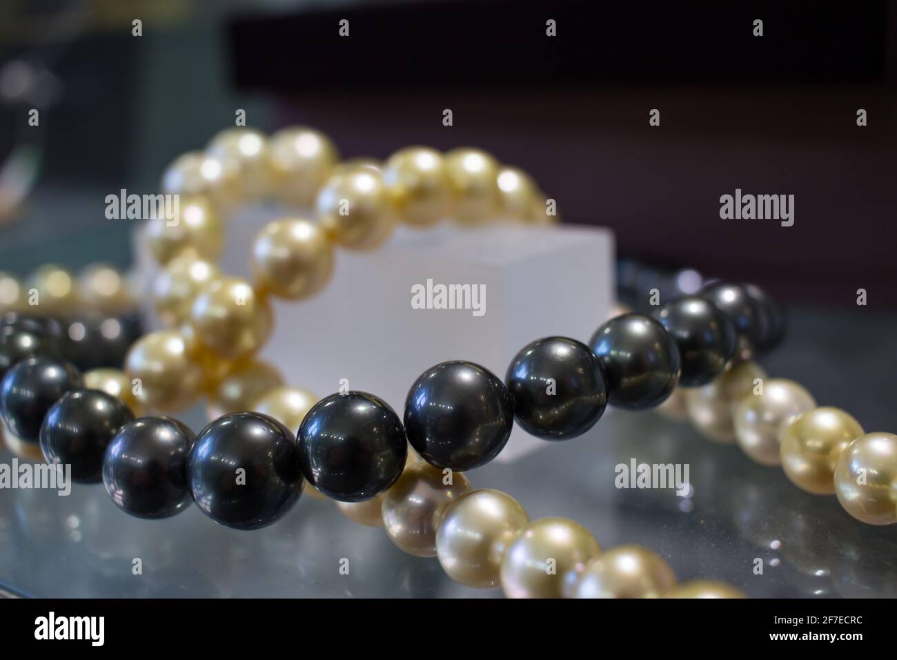 Black and gold cultured south sea pearls Stock Photo - Alamy
