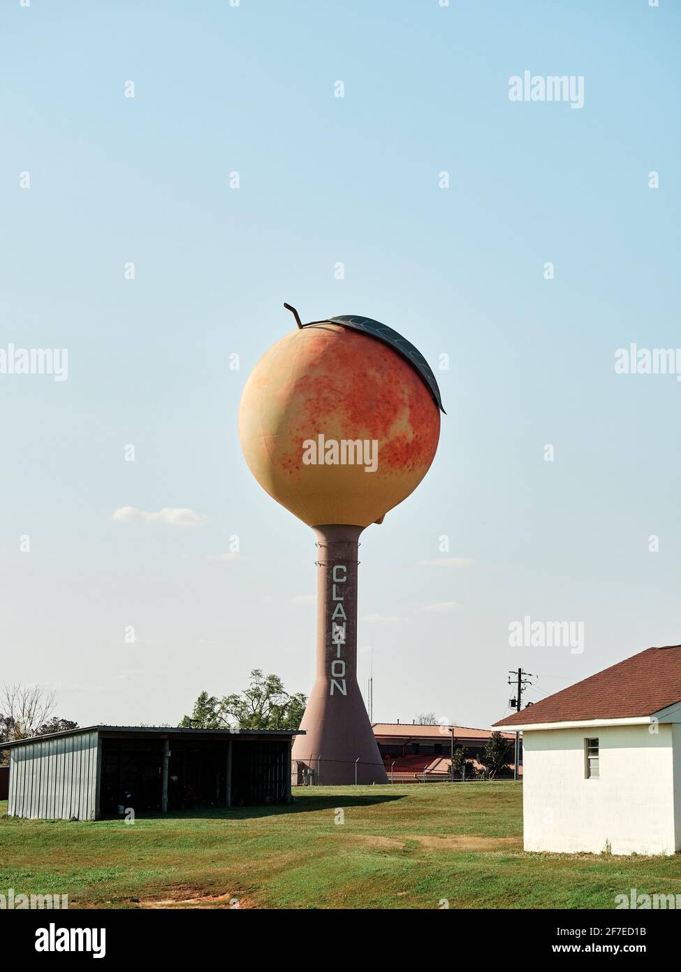 Clanton in Chilton County Alabama, USA, has the large peach water tower overlooking peach orchards. Stock Photo