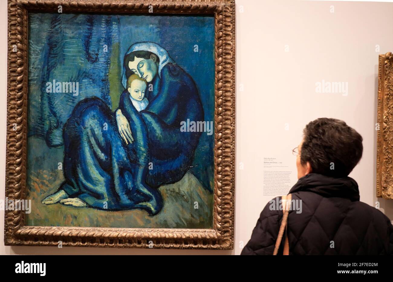 Art lovers admire a painting by Pablo Picasso 'Femme aux bras croises', a  magnificent Blue period canvas painted in Barcelona in 1902. The painting  was unveiled at Christie's, central London, as the