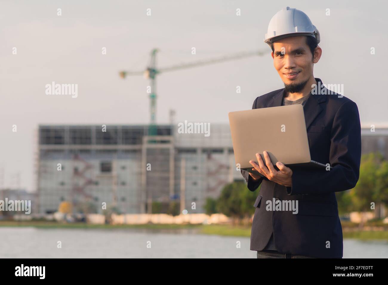 Business working laptop computer technology survey on site construction factory Stock Photo