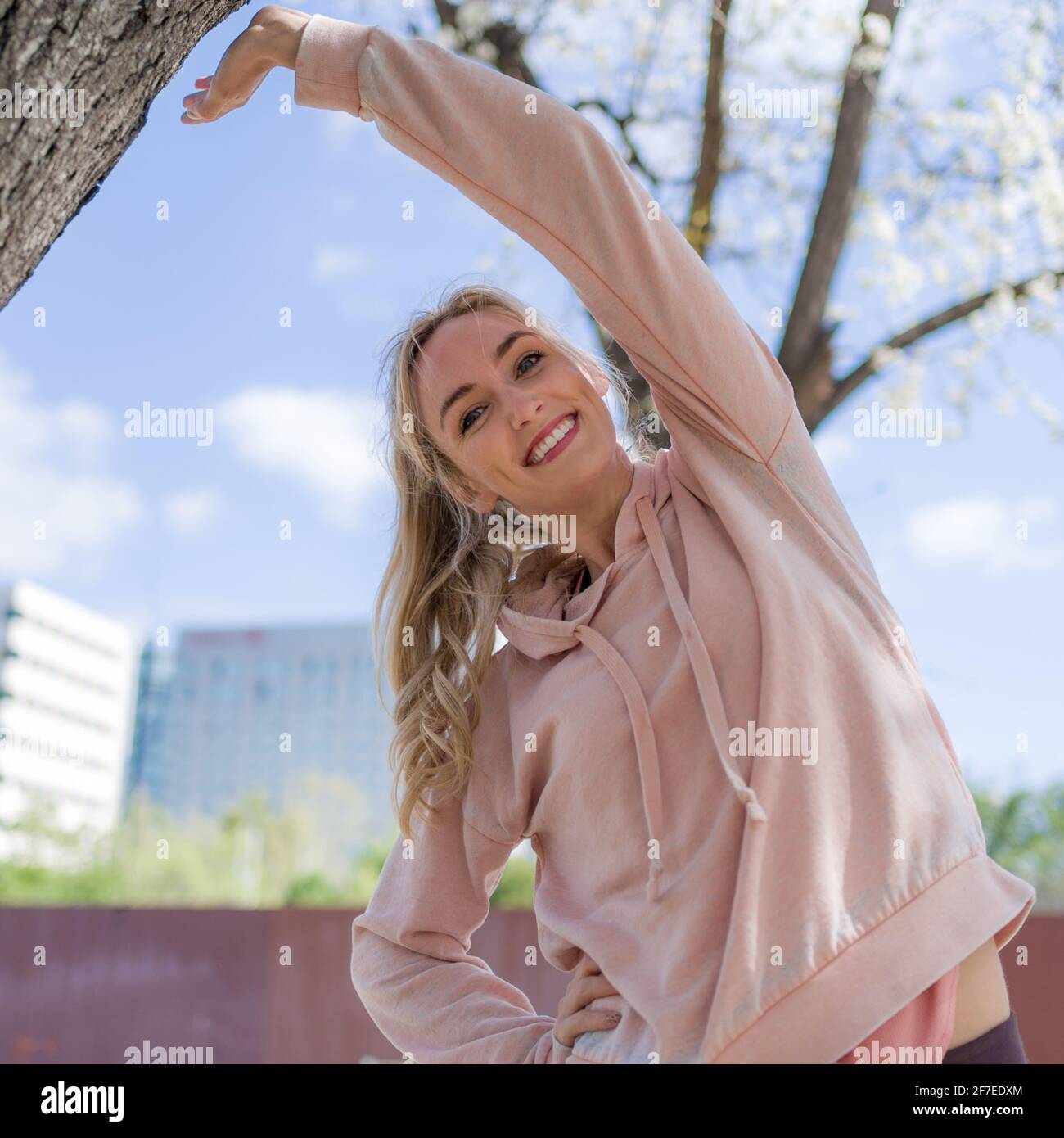 Blonde woman stretching hi-res stock photography and images - Alamy