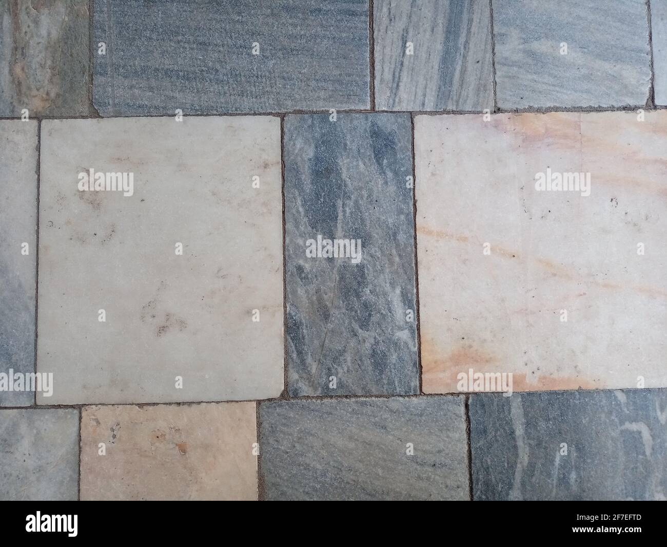 Marble floor texture. There are marble tiles on the floor. Stone