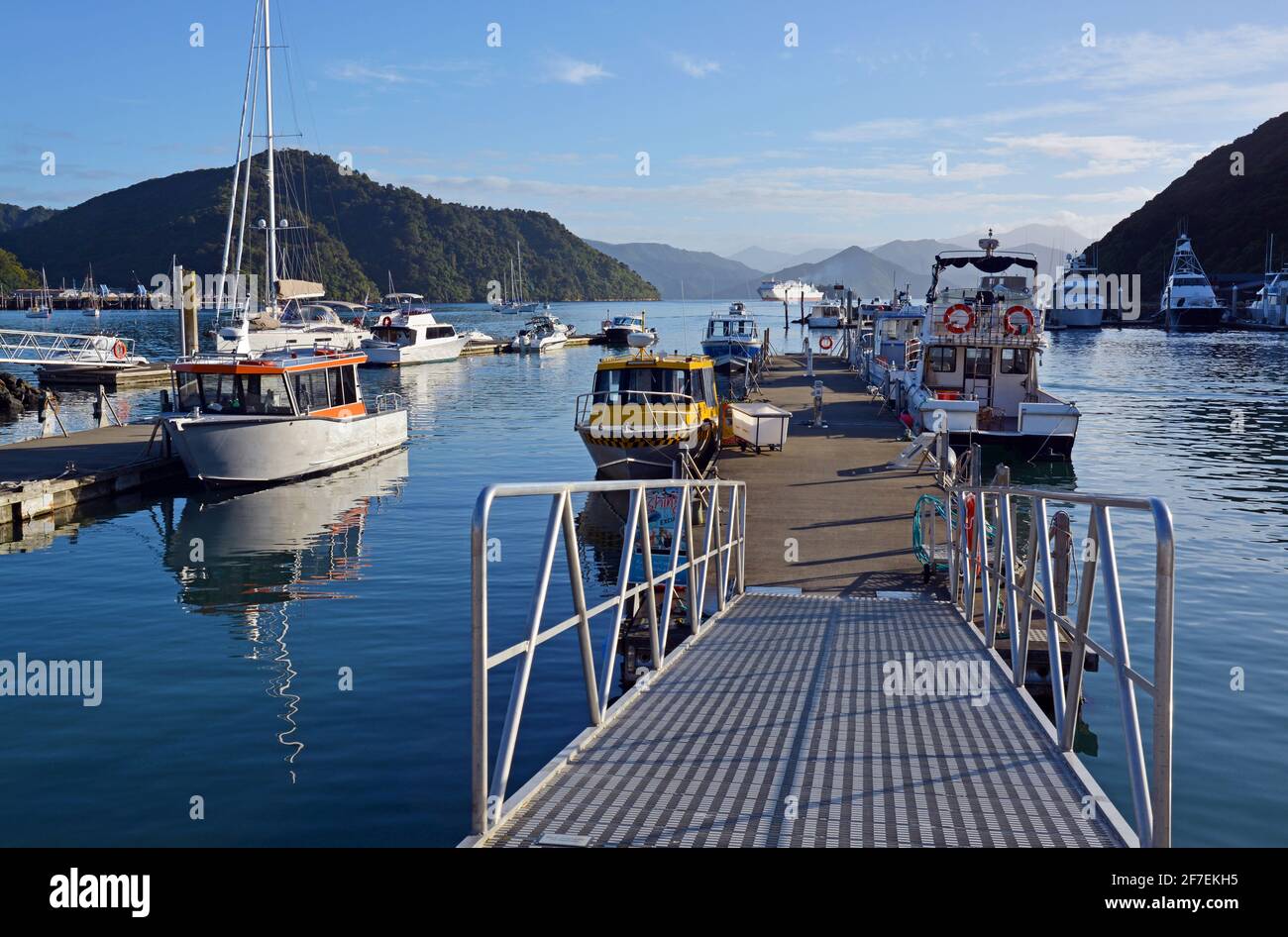 Charter Fishing Boats and Water Taxis, early morning, Picton, New Zealand in Autumn Stock Photo