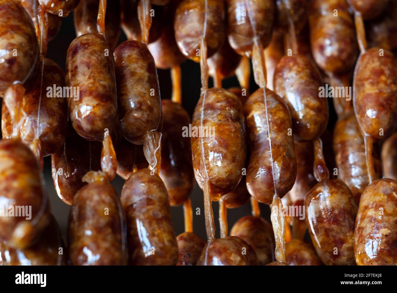 Local Filipino sausage delicacy on display for sale to tourists in a