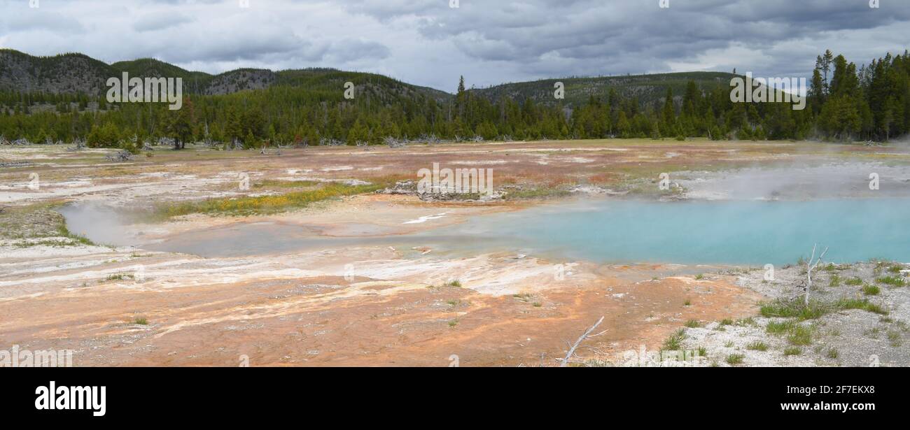 Late Spring in Yellowstone National Park: Wall Pool of the Sapphire Group in the Biscuit Basin Area of Upper Geyser Basin Stock Photo