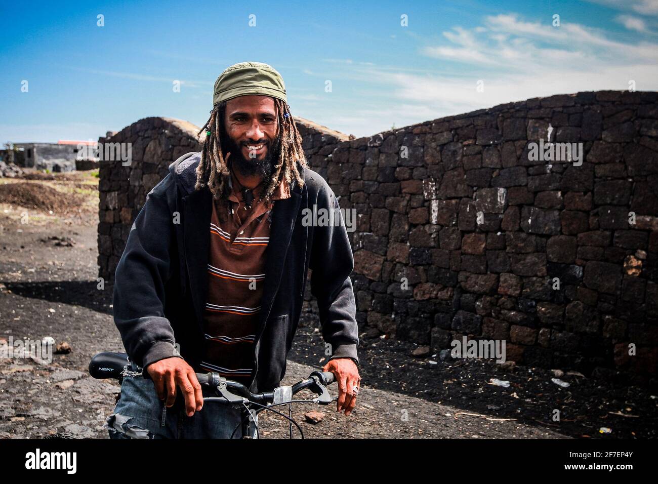 Cycling Rasta Rastafari rasta man dreadlocks hi-res stock photography and images - Alamy
