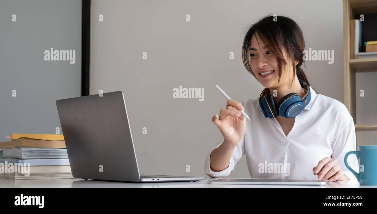 User experience concept. Creative Web Designer sketching application and developing template layout on laptop, framework for digital devices. Stock Photo