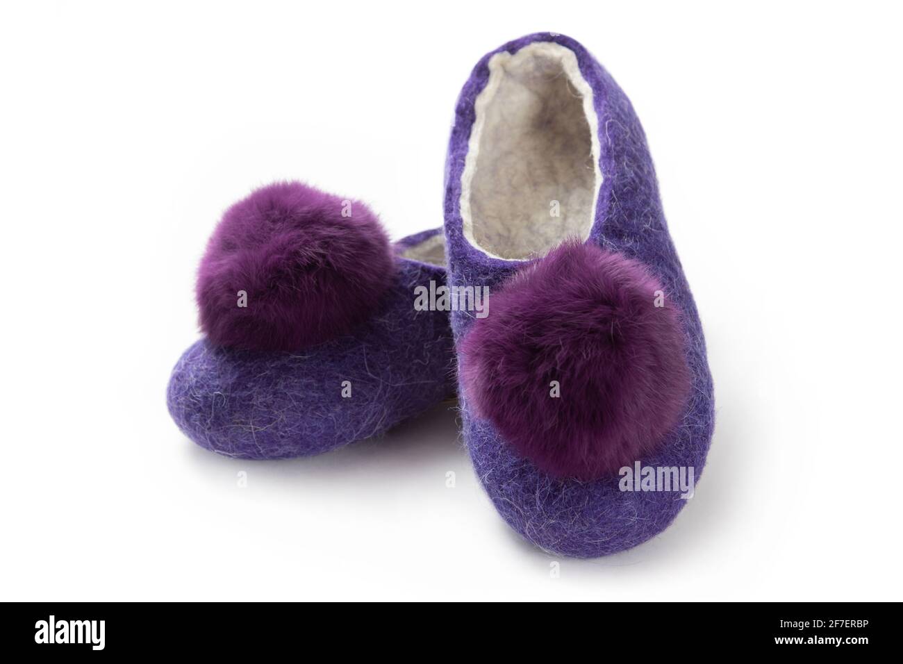 Felt slippers on white background in closeup Stock Photo