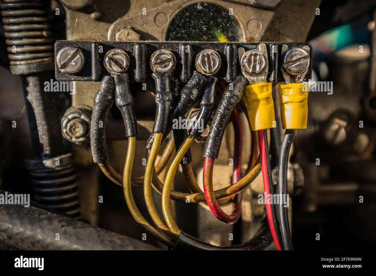 Different electric connectors on a junction box on an outboard engine