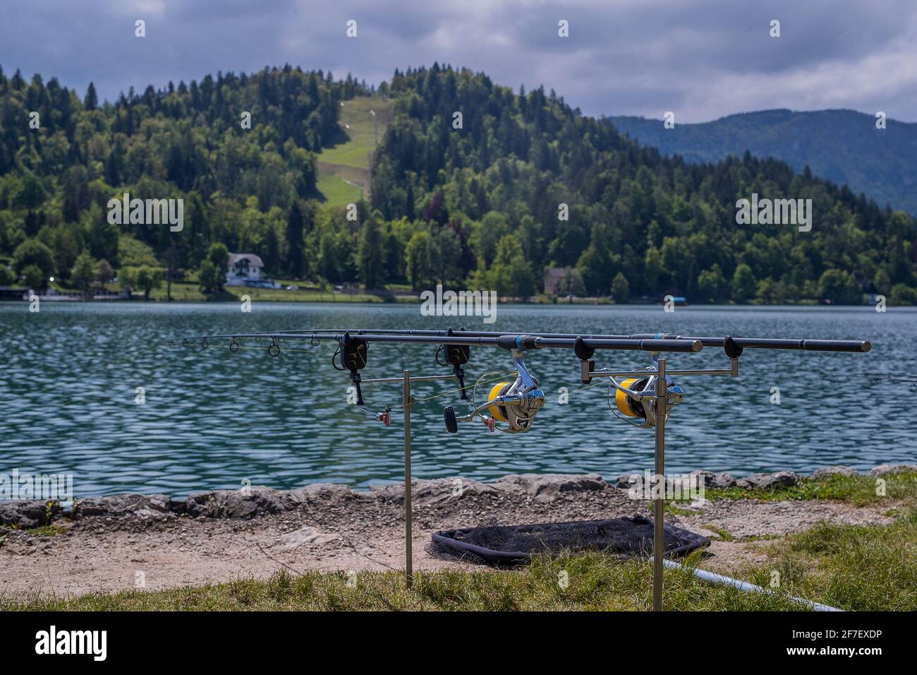 Two professional fishing rods on lake Bled, Slovenia. Fishermen