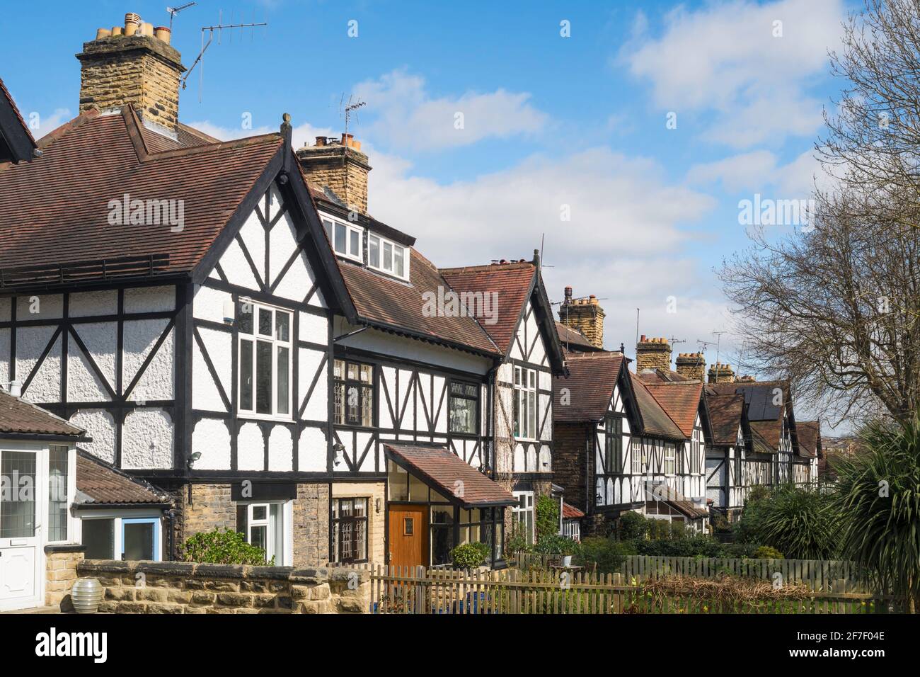 A row of arts and crafts style semi detached houses in Belle Vue Avenue, Roundhay, Leeds, England, UK Stock Photo
