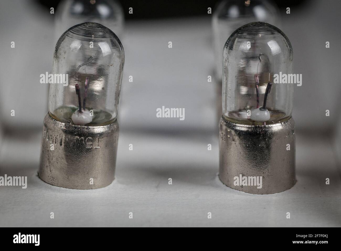 Position Light Bulbs Detail of older type position lamp bulb of a car. Multitude of position ...