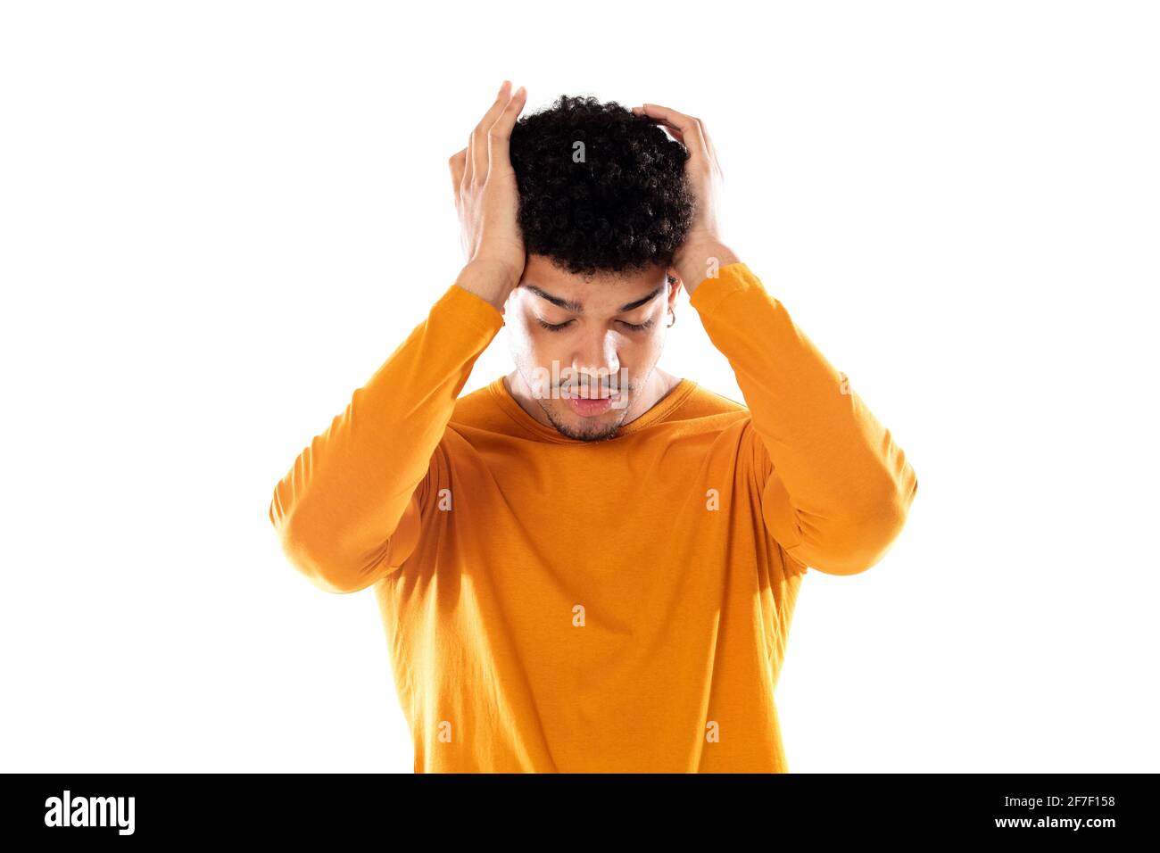 Young afro guy touching temples and having headache. Stock Photo