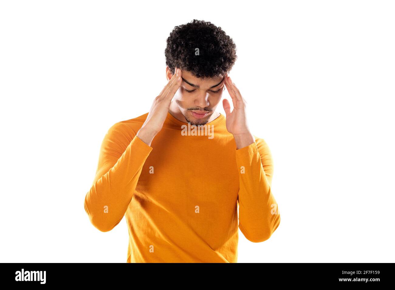 Young afro guy touching temples and having headache. Stock Photo