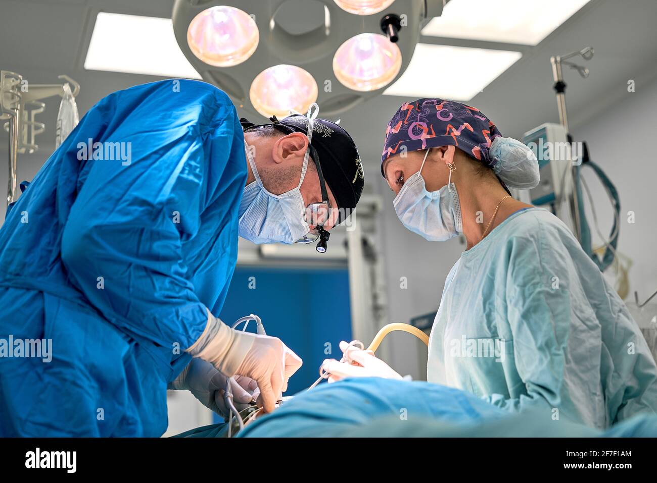 doctors work hard in the operating room Stock Photo