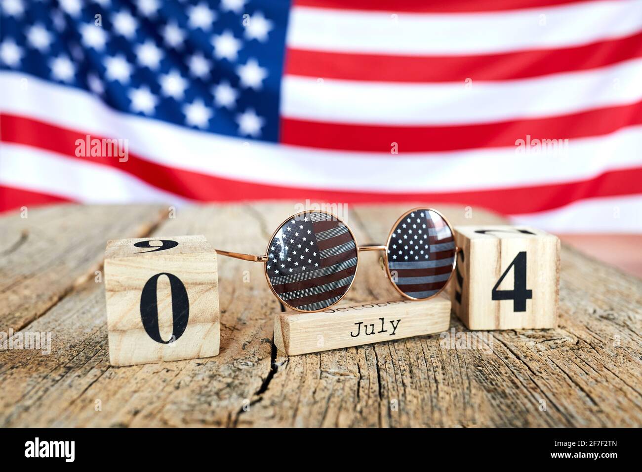 Wooden calendar with numbers on which the image of America's ...
