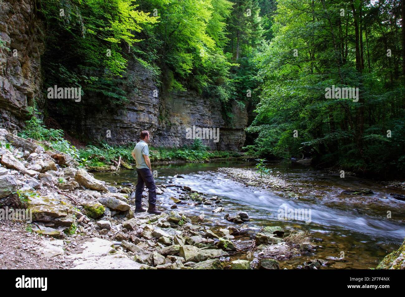 a man stands at the Wutach, nature reserve Wutach gorge, Schwarzwald, Baden-Wurttemberg, Germany Stock Photo