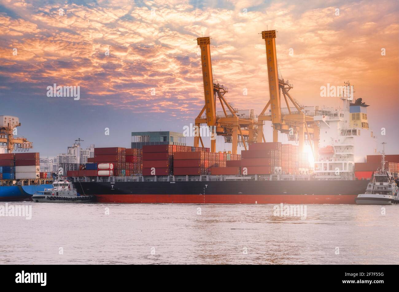 Aerial view from drone Logistics and transportation of Container Cargo ship and Cargo import export , Business logistics concept, Stock Photo