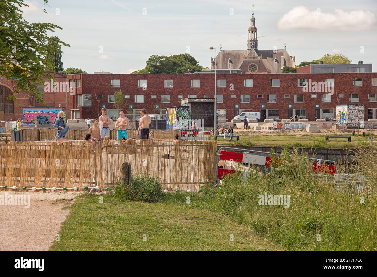 Young people on an urban beach in Groningen, The Netherlands Stock Photo