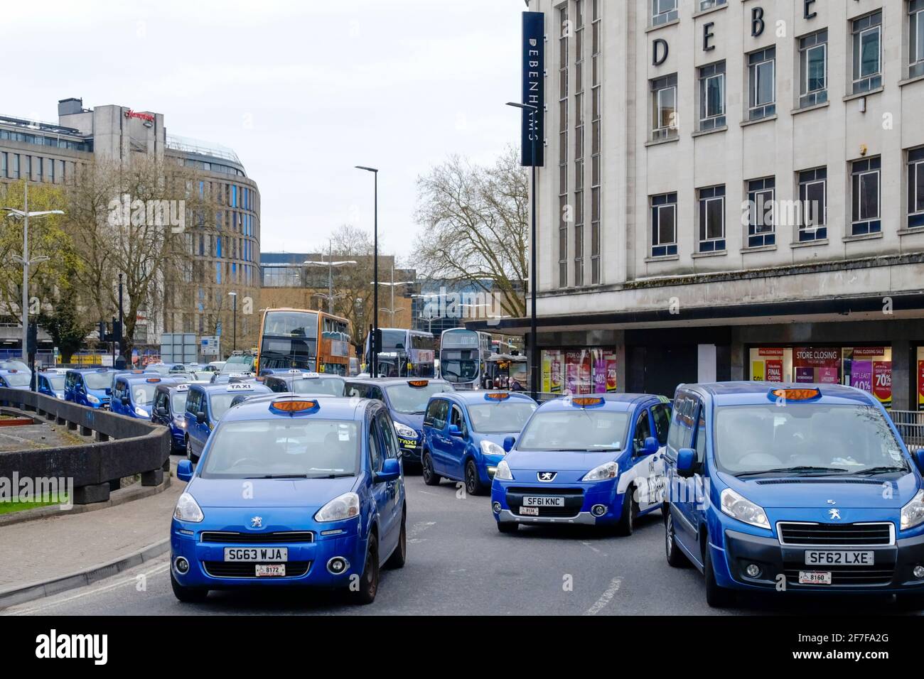 City Centre, Bristol, UK. 7th Apr, 2021. Blue Bristol taxi drivers stage a protest by driving slowly in the city. Traffic has come to a standstill. Taxi drivers are concerned about the payments given to self employed drivers during covid-19 lockdown and the city's changes to a Taxi rank outside the Bristol Hippodrome. Credit: JMF News/Alamy Live News Stock Photo