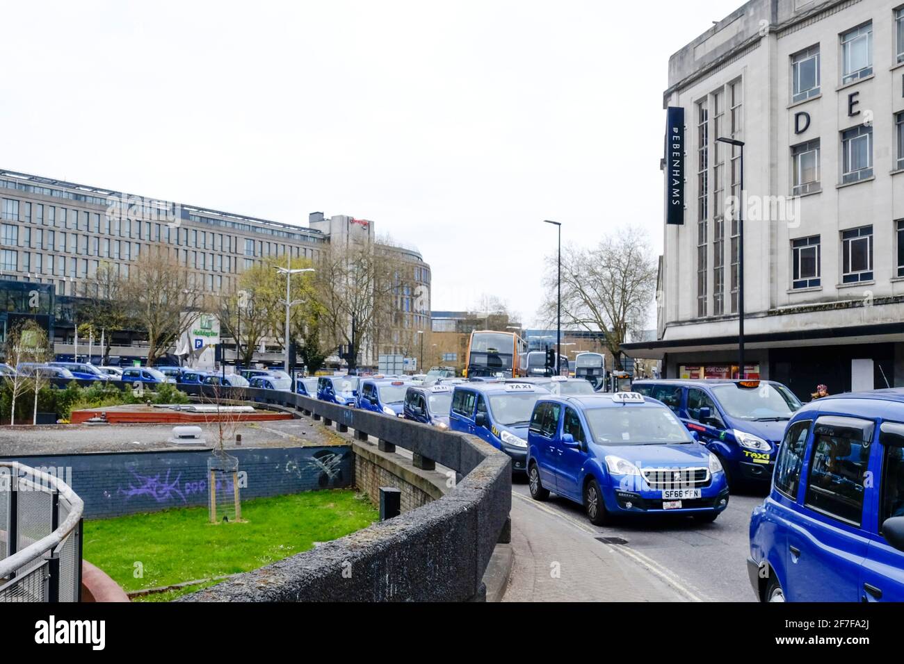 City Centre, Bristol, UK. 7th Apr, 2021. Blue Bristol taxi drivers stage a protest by driving slowly in the city. Traffic has come to a standstill. Taxi drivers are concerned about the payments given to self employed drivers during covid-19 lockdown and the city's changes to a Taxi rank outside the Bristol Hippodrome. Credit: JMF News/Alamy Live News Stock Photo