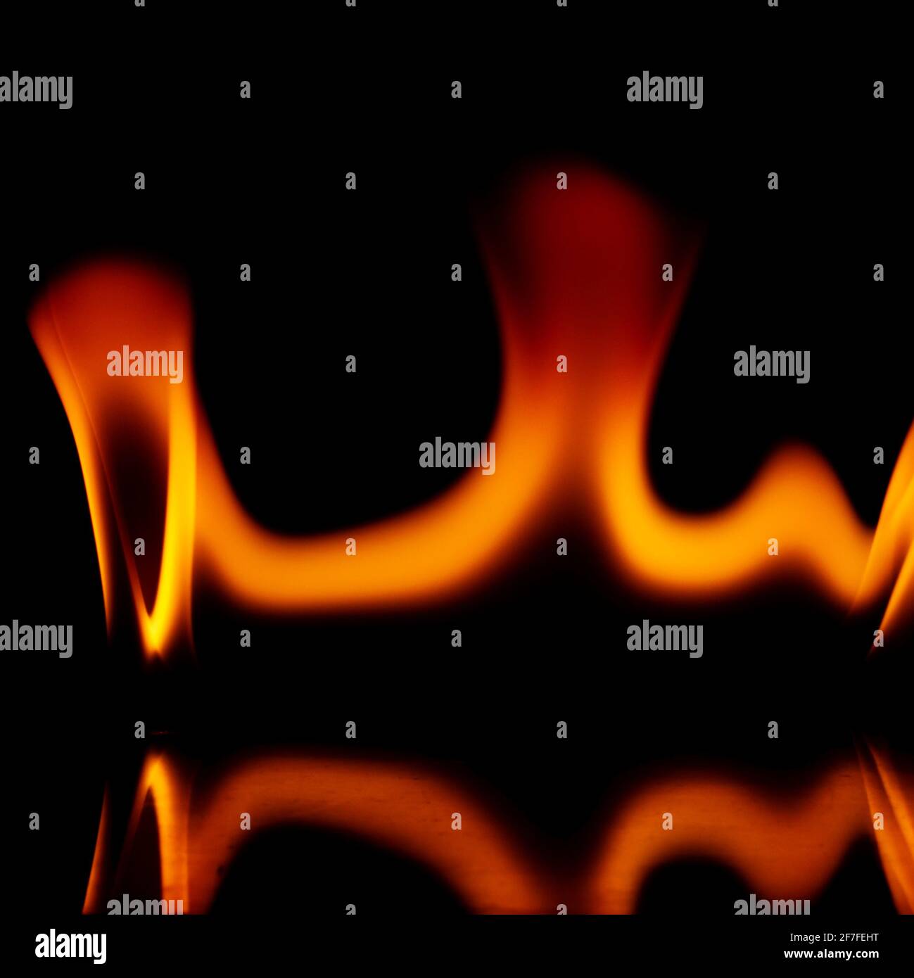 Fire flames isolated on a black background Stock Photo - Alamy
