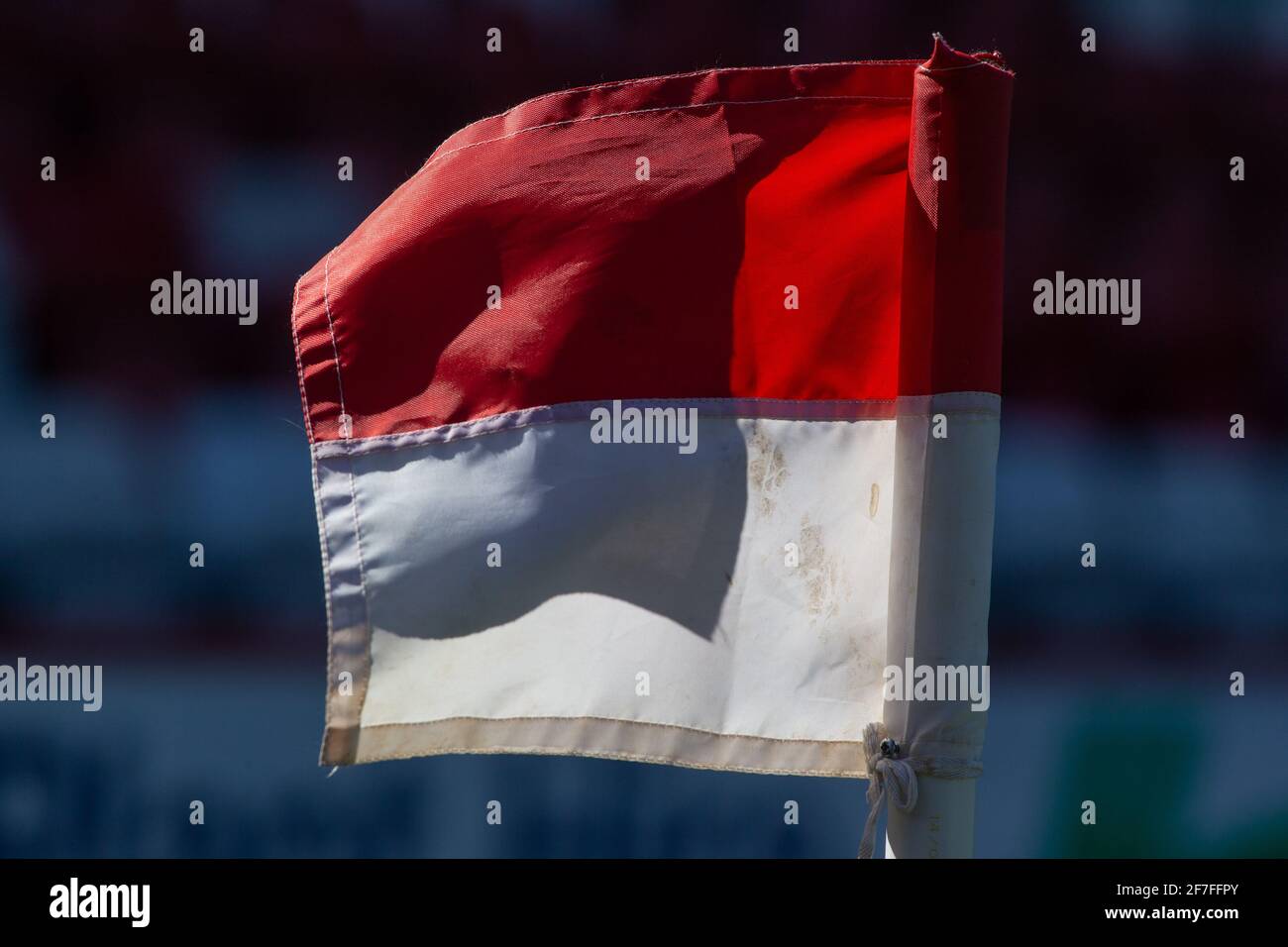 Close up of corner flag at football soccer stadium in UK Stock Photo