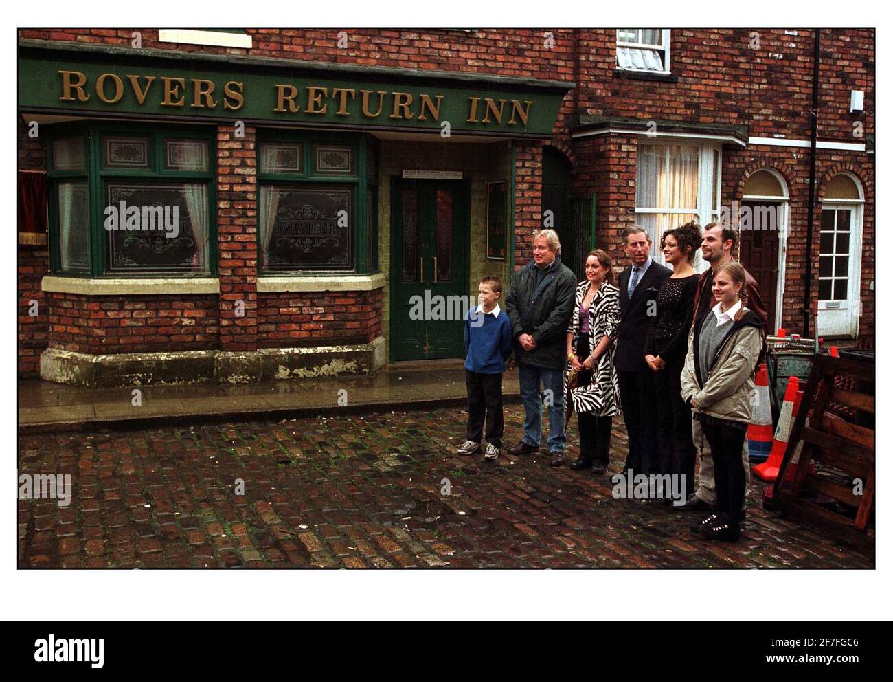 H.R.H. The Prince of Wales today visited the set of Coronation Street to mark the occasion of the programs 40th anniversary. H.R.H. took part in celebrations and met cast and crew as they prepare for tonights historic live episode. The cast were Ken Barlow (William Roache) Linda Baldwin(Jacquline Pirie) young David Platt(Jack P Shepherd) Geena Gregory(Jennifer James) Sarah Platt(Tina O'Brien) and Steve Mc Donald(Simon Gregson)pic David Sandison 8/12/2000 Stock Photo