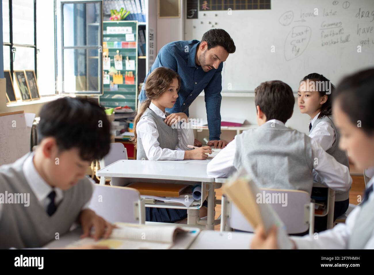 Students learning in classroom Stock Photo