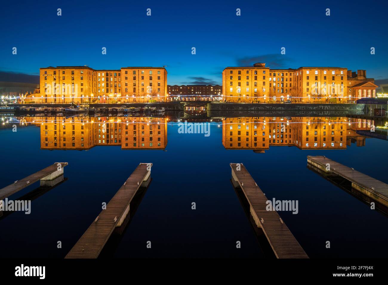 The Royal Albert Dock with perfect reflections at night, UNESCO World Heritage Site, Liverpool, Merseyside, England, United Kingdom, Europe Stock Photo