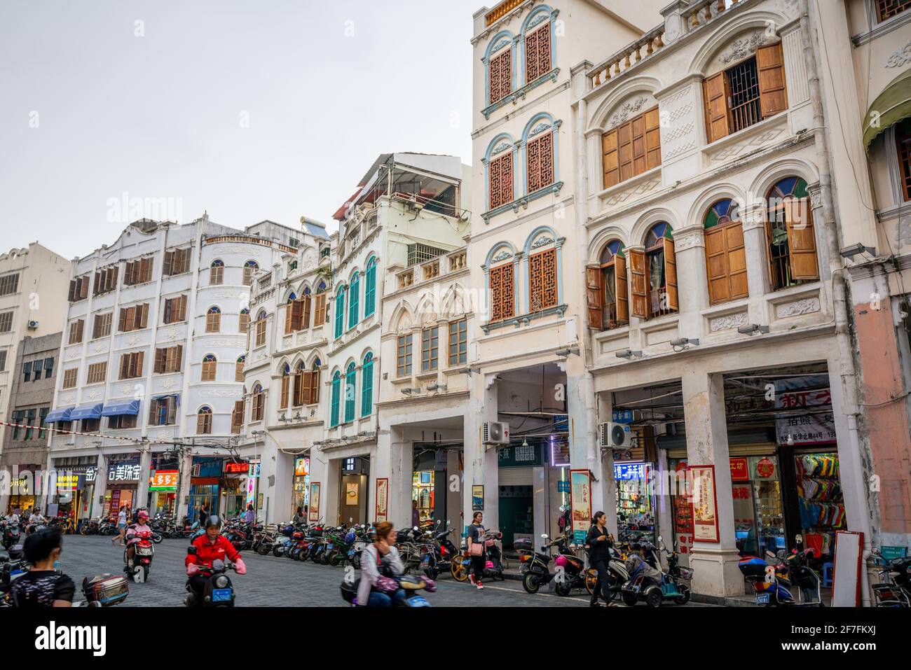 Haikou China , 21 March 2021 : Street view of Xinhua north road with many colorful old colonial buildings in Haikou Qilou old town Hainan China Stock Photo