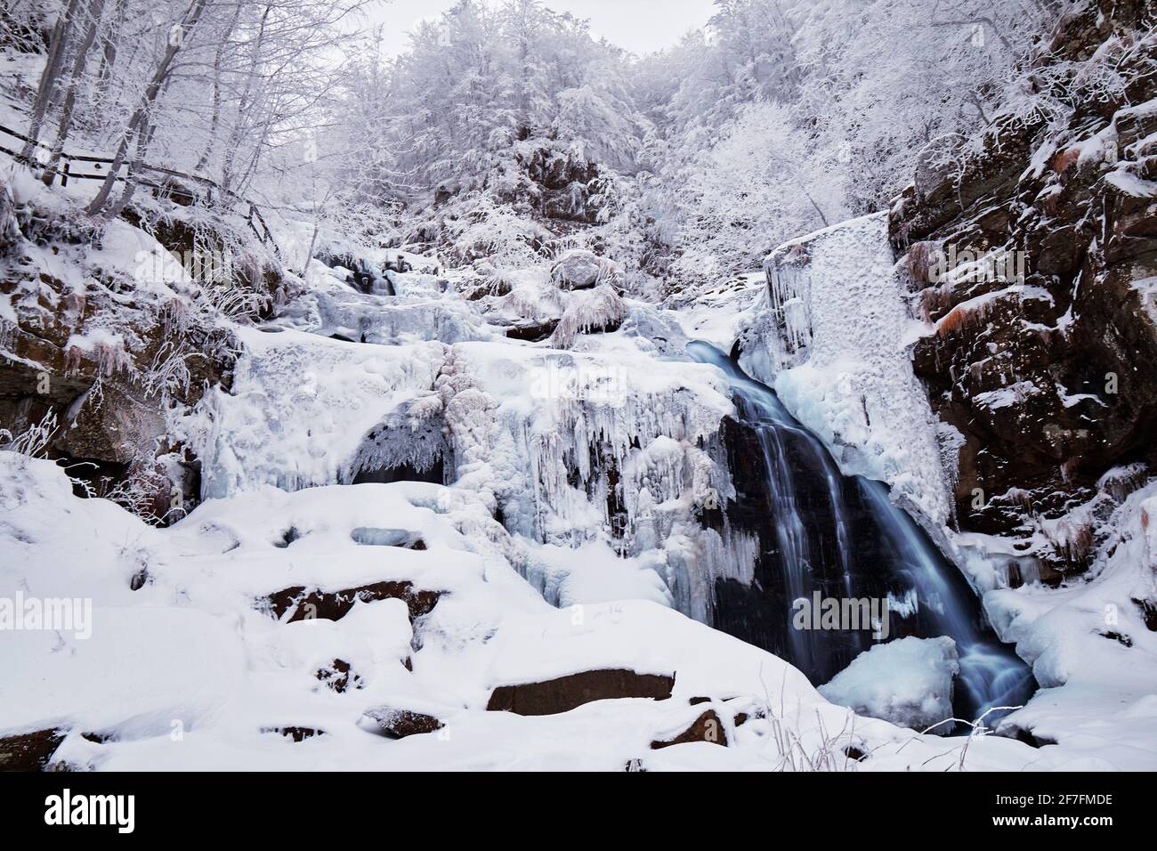 Frozen Dardagna waterfalls in winter with snow, Parco Regionale del Corno alle Scale, Emilia Romagna, Italy, Europe Stock Photo