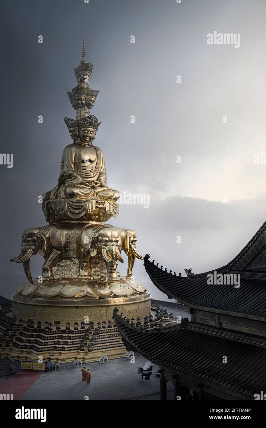 Golden summit Buddhist shrine gets his name from this huge golden statue of Puxian (Samantabhadra), Emeishan, Sichuan, China, Asia Stock Photo