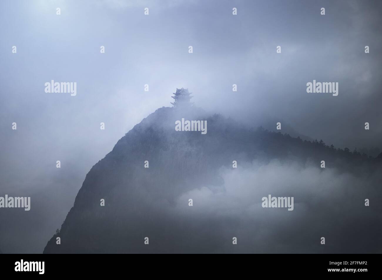 Misty pagoda in the fog on top of Emeishan, Sichuan, China, Asia Stock Photo