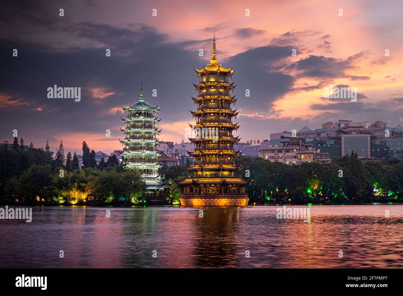 Sun and Moon pagodas at sunset in Guilin, Guilin, Guangxi, China, Asia Stock Photo