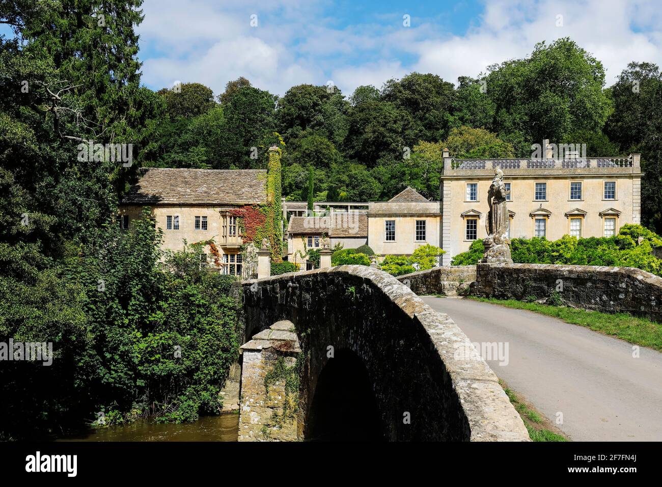 Iford Manor by the River Frome, this 18th-19th century version was created with popular gardens, Iford, Bradford-on-Avon, Wiltshire, England Stock Photo